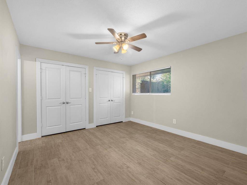 The primary bedroom features double closets.