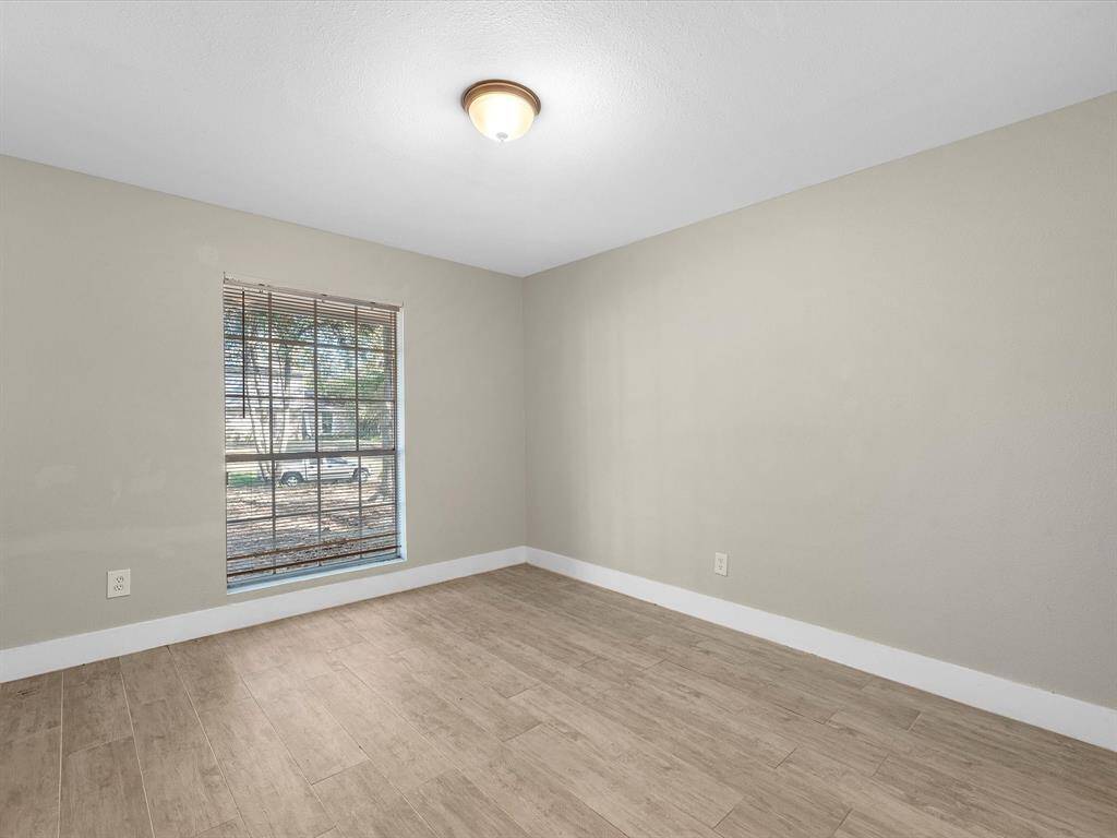 One of the secondary bedrooms provides a comfortable and versatile space.
