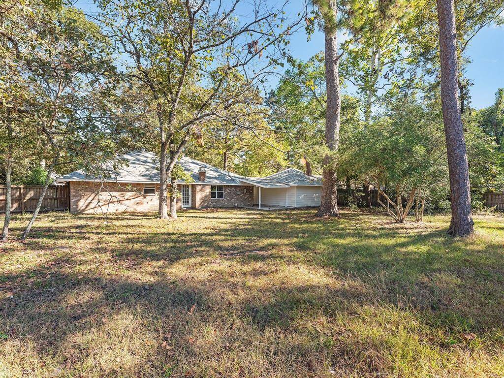 The oversized backyard offers ample space for leisure activities and outdoor enjoyment.