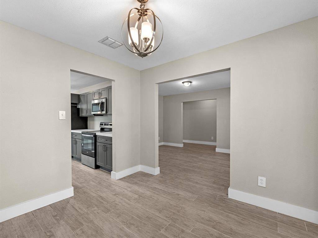 Formal dining room with access to both the kitchen and formal living area.