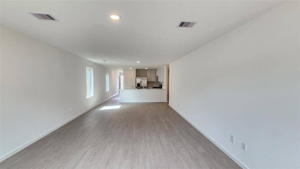 Family Room to Dining and Kitchen
