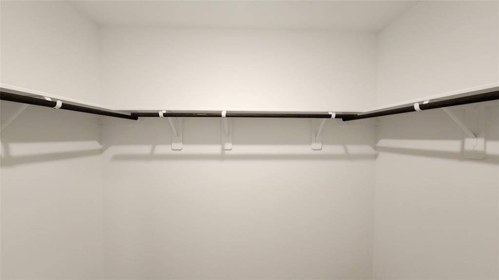Master closet in master bathroom