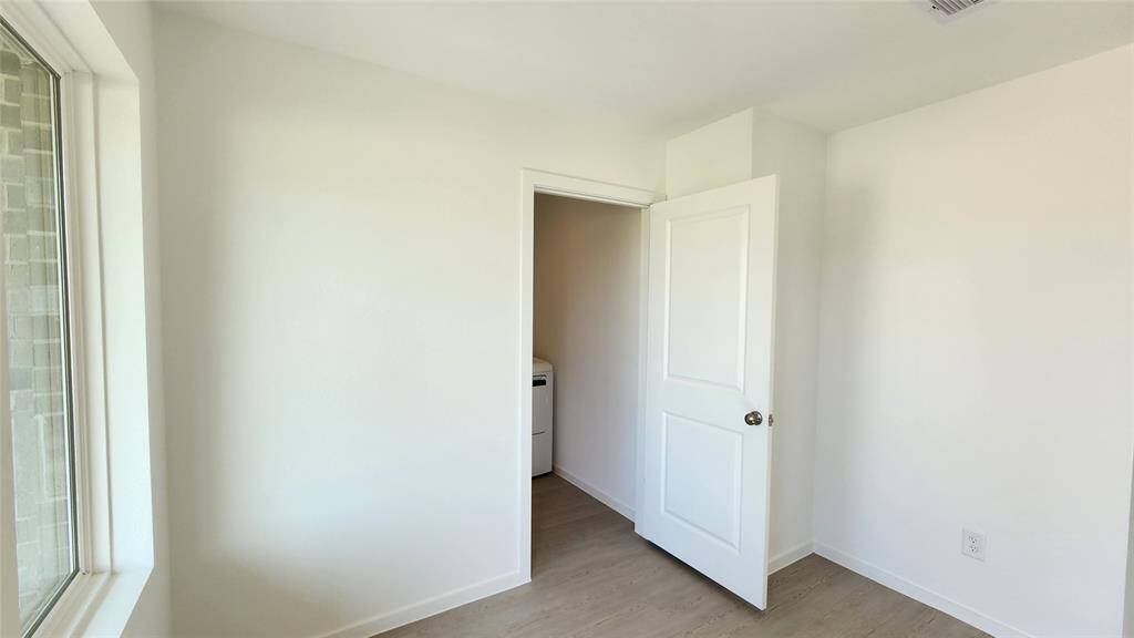 Foyer to in-house laundry room to garage
