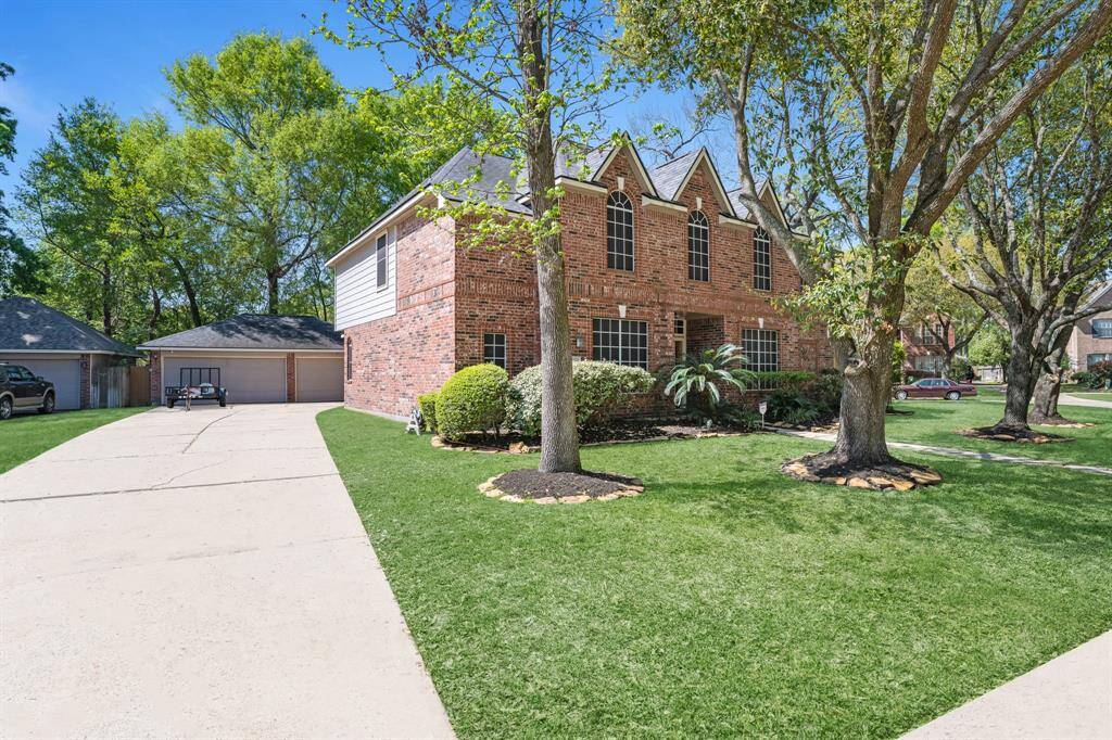 Welcome to your dream home! This charming brick house features a spacious driveway, lush landscaping, and a serene neighborhood setting. Perfect for creating lasting memories.