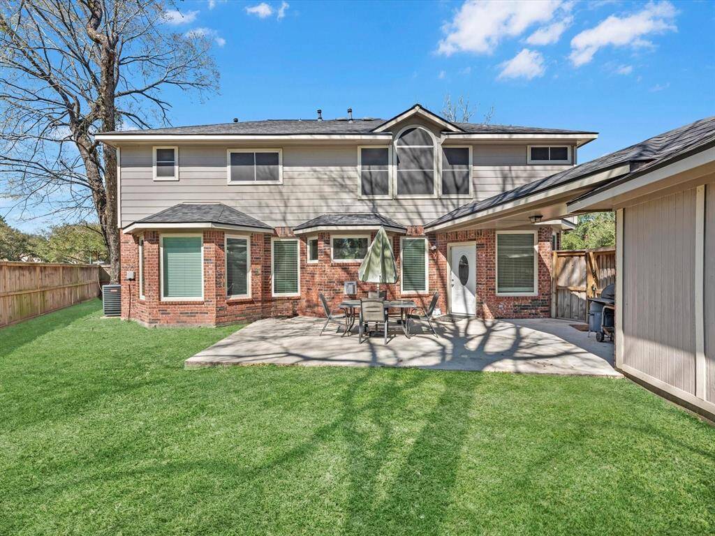 Experience the perfect blend of comfort and style in this inviting backyard oasis, ideal for relaxation and entertaining.
