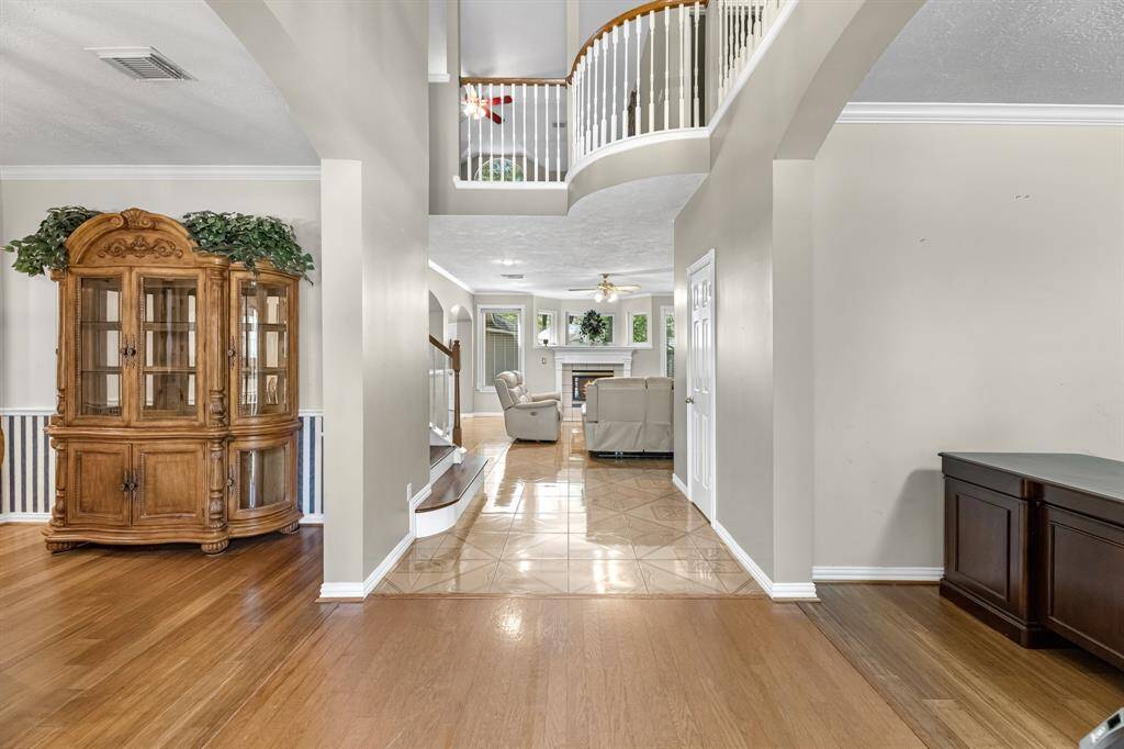 Welcome home to elegance and warmth. This inviting space features an open layout with a cozy fireplace and stylish finishes, perfect for comfortable living and entertaining.