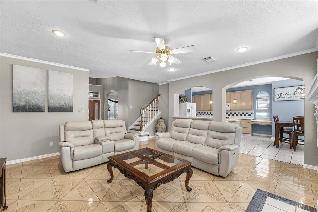 Discover the perfect blend of comfort and style in this inviting living space, ideal for relaxation and entertaining.