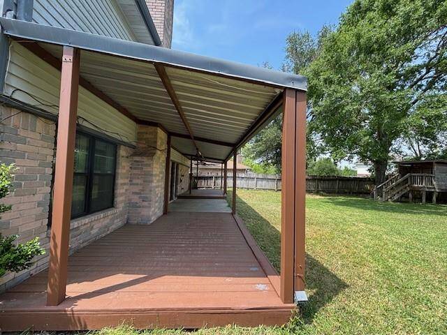 The backyard of this home is spacious and fully fenced, offering plenty of room for outdoor fun, pets, or future additions like a garden or playset. A covered patio provides the perfect shaded spot for relaxing or entertaining guests. It's a private and versatile space with tons of potential!