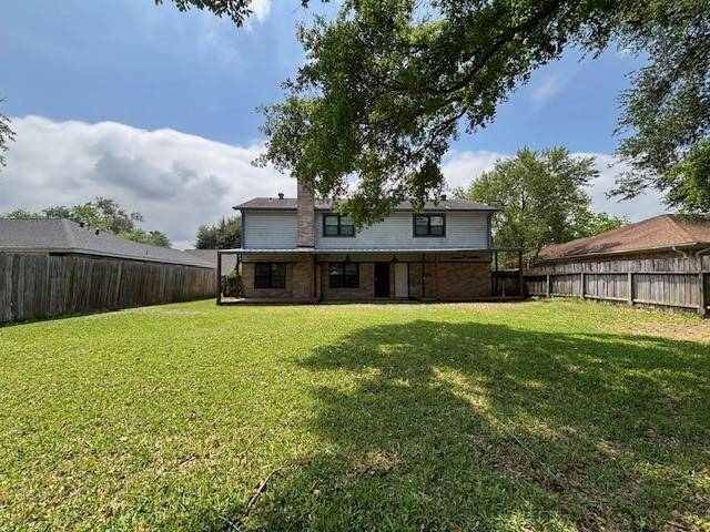 Step into a backyard made for relaxing and entertaining! This spacious, fully fenced outdoor area offers privacy and plenty of room to play, garden, or host gatherings. Whether you envision summer barbecues or quiet mornings with coffee on the patio, this yard is ready for your personal touch.