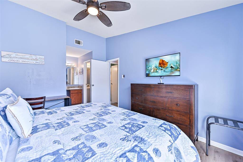 Also with a king sized bed, TV, and dresser.