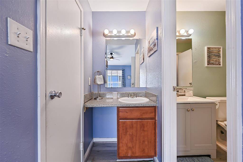 Walk-in closet access to the left. Notice the additional vanity with a separate sink offered by this specific floorplan. Other floorplans here do not offer this.