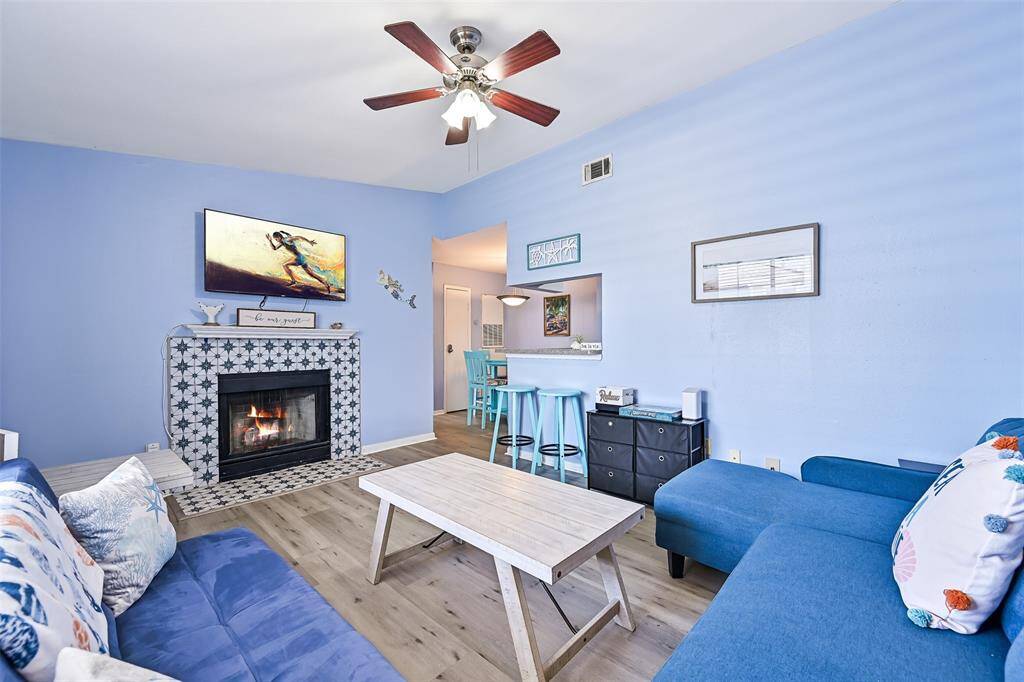 Fully-furnished, to include electronics. Just bring your packed bags. The recently-retiled fireplace remains as mock-only, the fire is virtual.