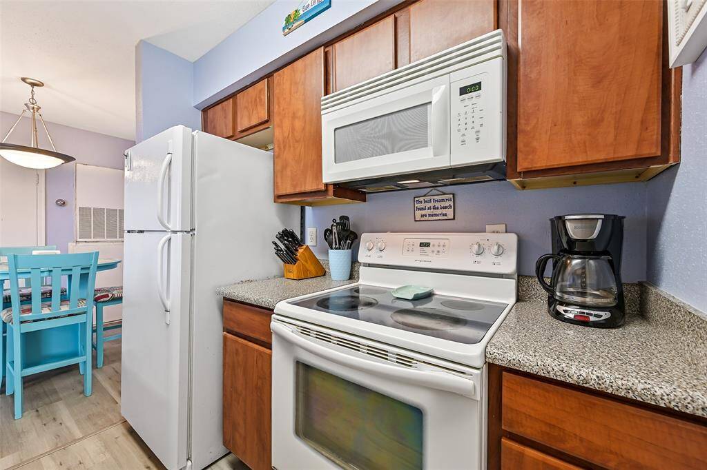 All appliances, even down to the utensils, and coffee maker - included!