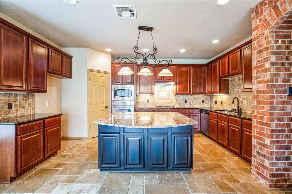 Kitchen with oversized island.