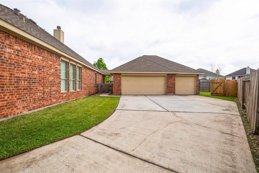 Huge Driveway with 3 car detached garage.