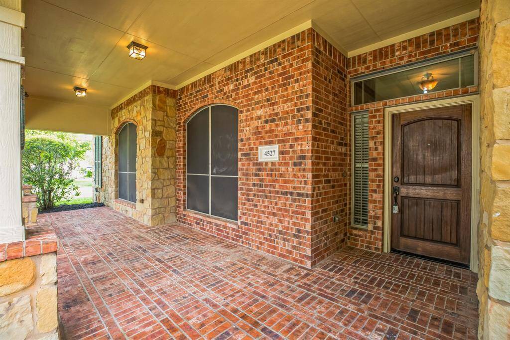 Oversized front porch with brick pavers!