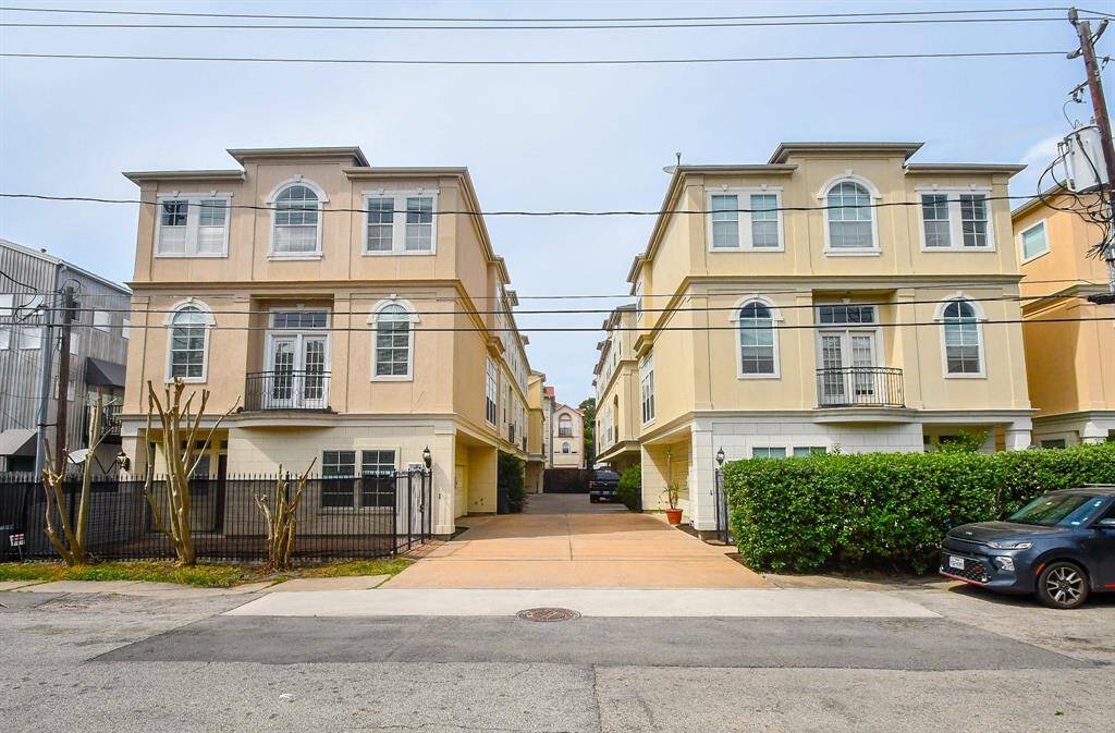 What a lovely place to call your new city home! This 3-story town home/condo RENTAL occupies a corner lot and is MOVE IN ready at 5208 Blossom Street, Unit 4, Houston, TX, in the gated Blossom Street Town Homes community. Private parking (dual vehicle attached garages) is seen, center, with charming balconies extending from the apartments, as shown.