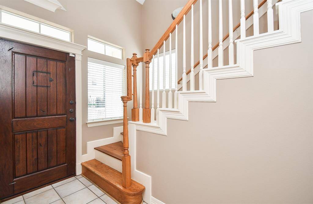 Nice natural light, the rustic appeal of the main entry door meets the lovely inviting staircase, just as you enter. Inside, are 3 bedrooms (all with ensuite baths) and 3-1/2 baths, total, occupying a 2,186 square-foot-lot with 1,800 square-feet of interior living space.