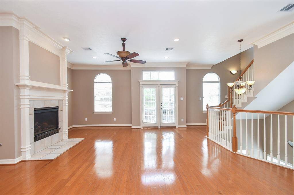 Don't worry that your comfy, oversized pieces won't fit! You've got incredible wall and floor space forall of your favorite things; with the built-in fireplace as the star of the show, in any season.