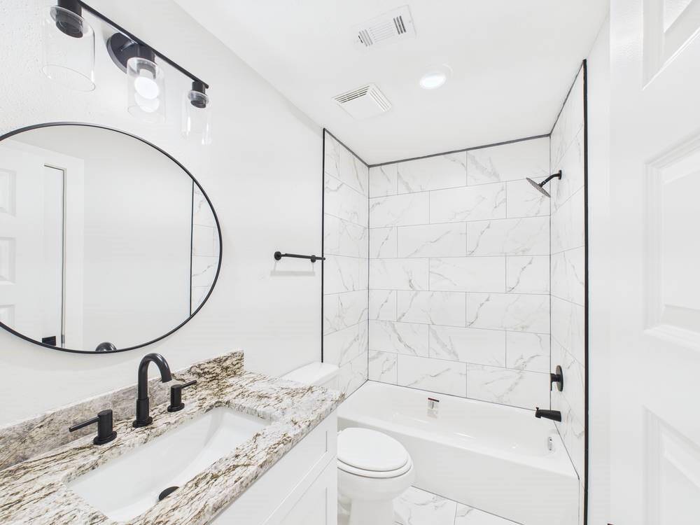 Every detail was thought of during this renovation. Check out the guest bathroom!