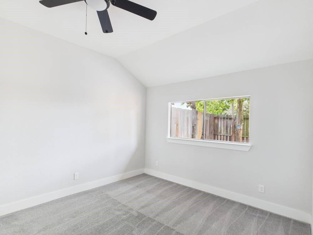 Spacious Primary Bedroom with High Ceilings