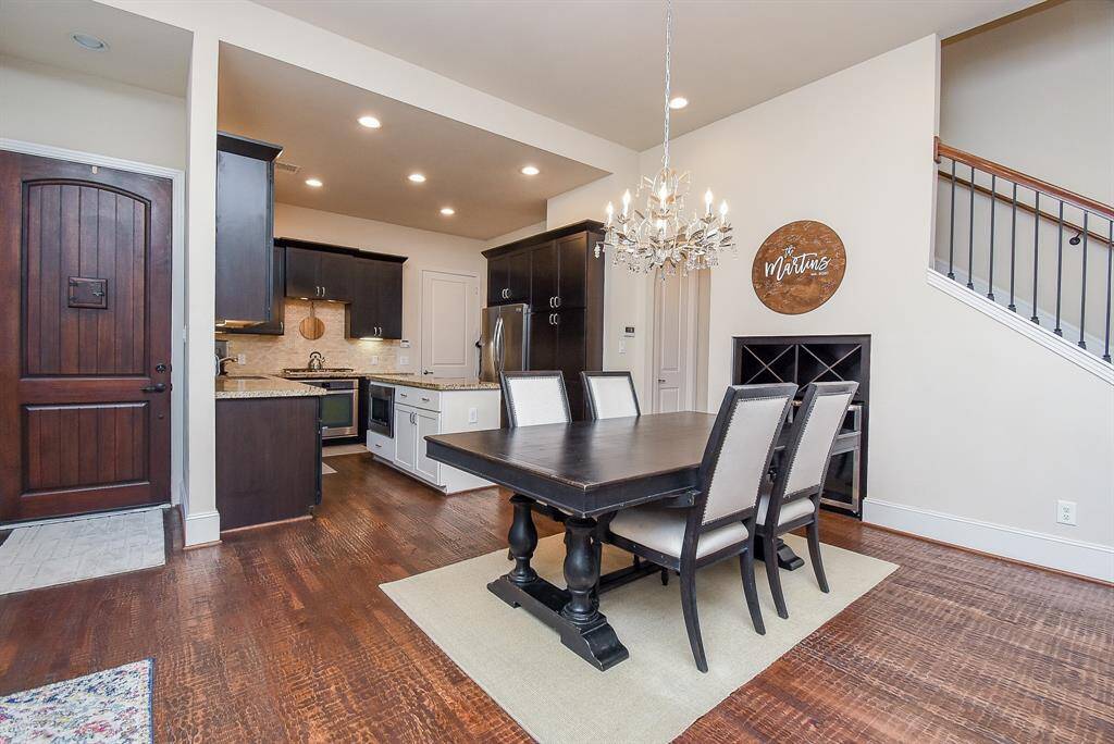 What a satisfying airy view in this gorgeous, combined kitchen/dining/living space.