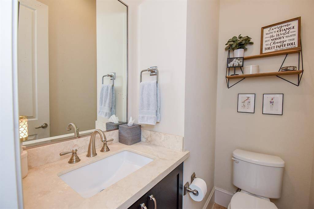 This half bath adds to the simple rustic nature of this home.