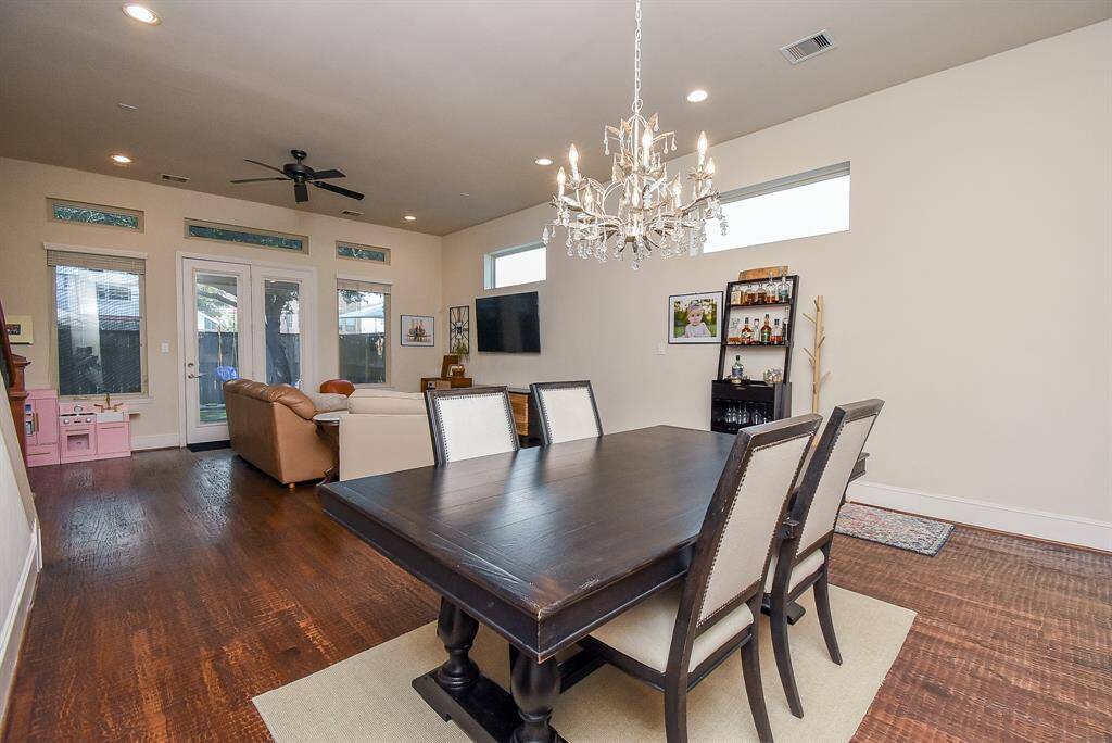 The open floorplan design concept gives you tremendous space to imprint your lifestyle, as seen here, with dining pieces and room for accents, too!