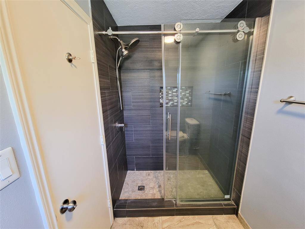 Clean and simple modern walk-in shower with plenty of space