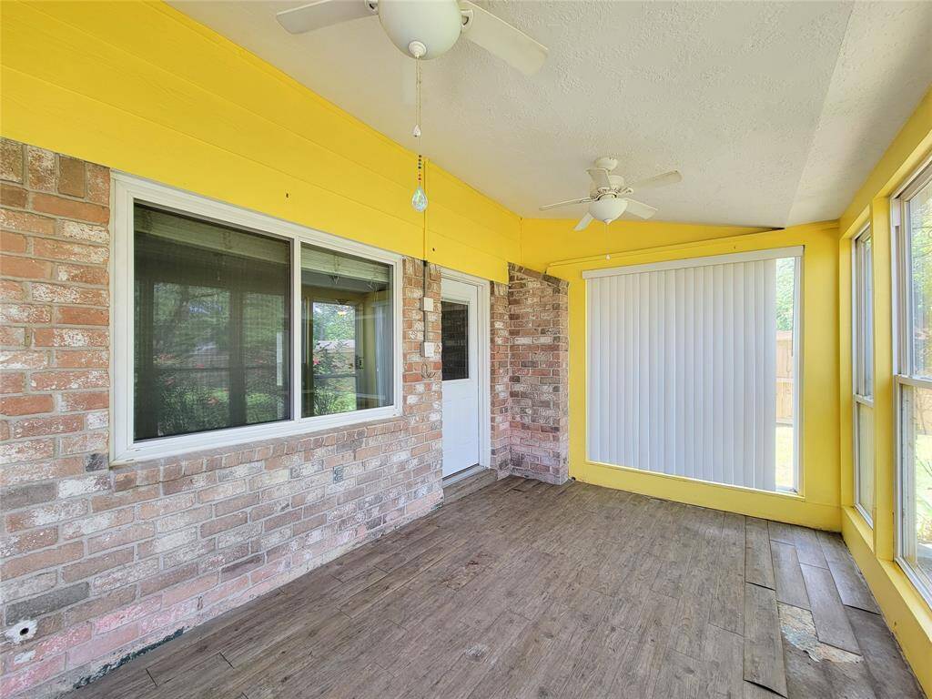With its bright yellow hue, this sunroom is ideal for both enjoying the sunshine and offering your pets a comfy spot to hang out.