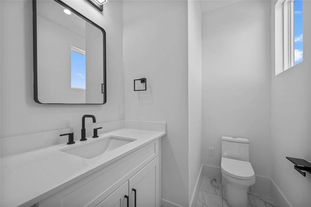 View of half bath by Game Room from similar plan