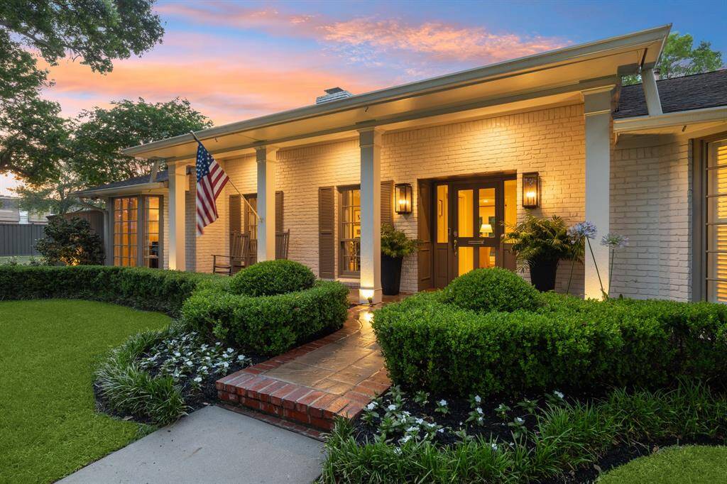 Landscape lighting highlights the exterior of the home along with the backyard and can be controlled via wifi.