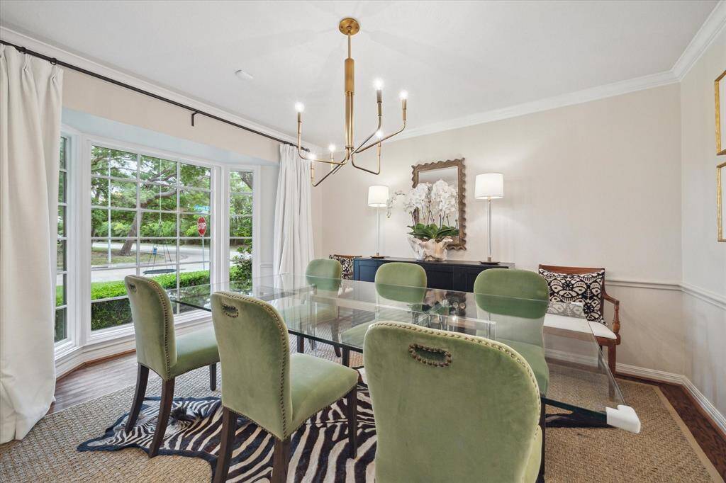The dining room has ample space for entertaining friends and family and features a large bay window.