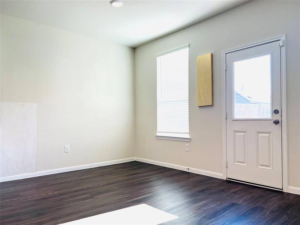 Granite kitchen opening to spacious living room