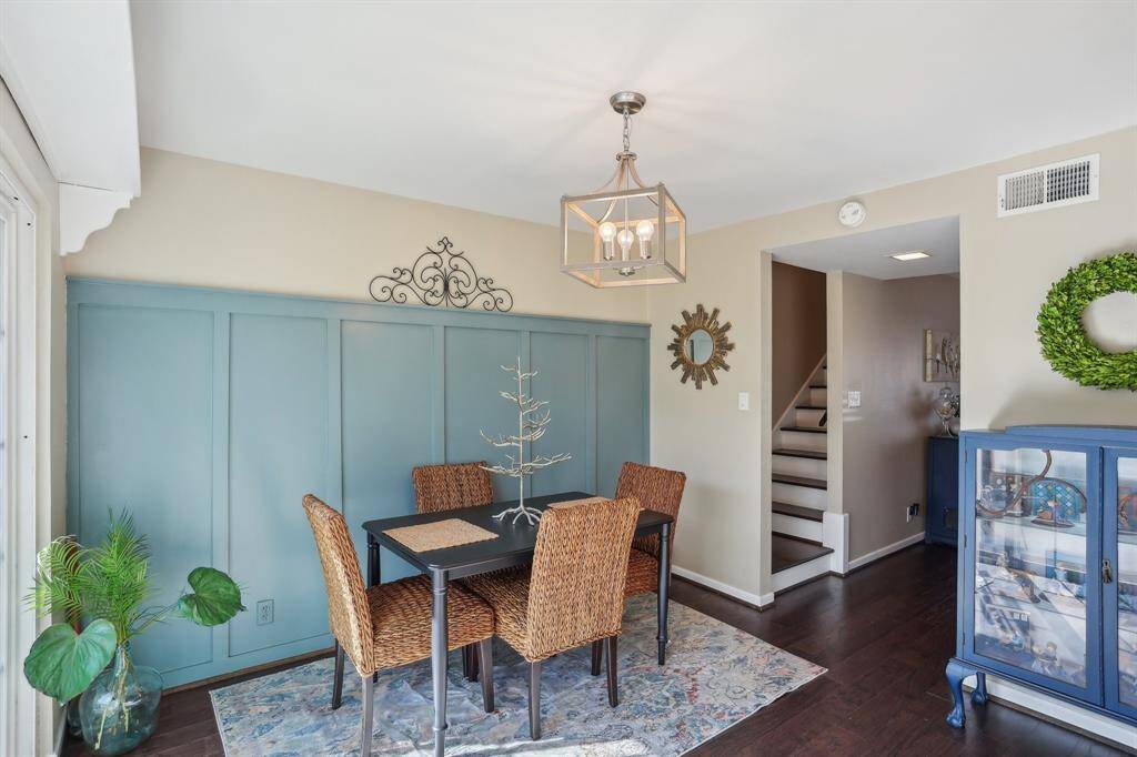 Dining room off the kitchen with ample natural lighting.