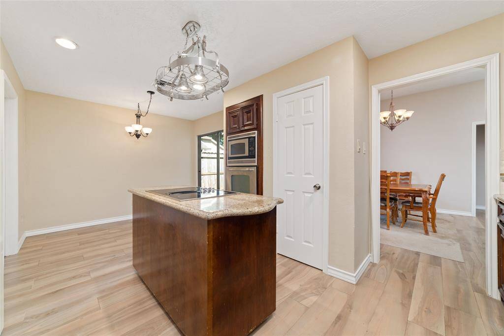 View of kitchen leading into dining room and breakfast nook