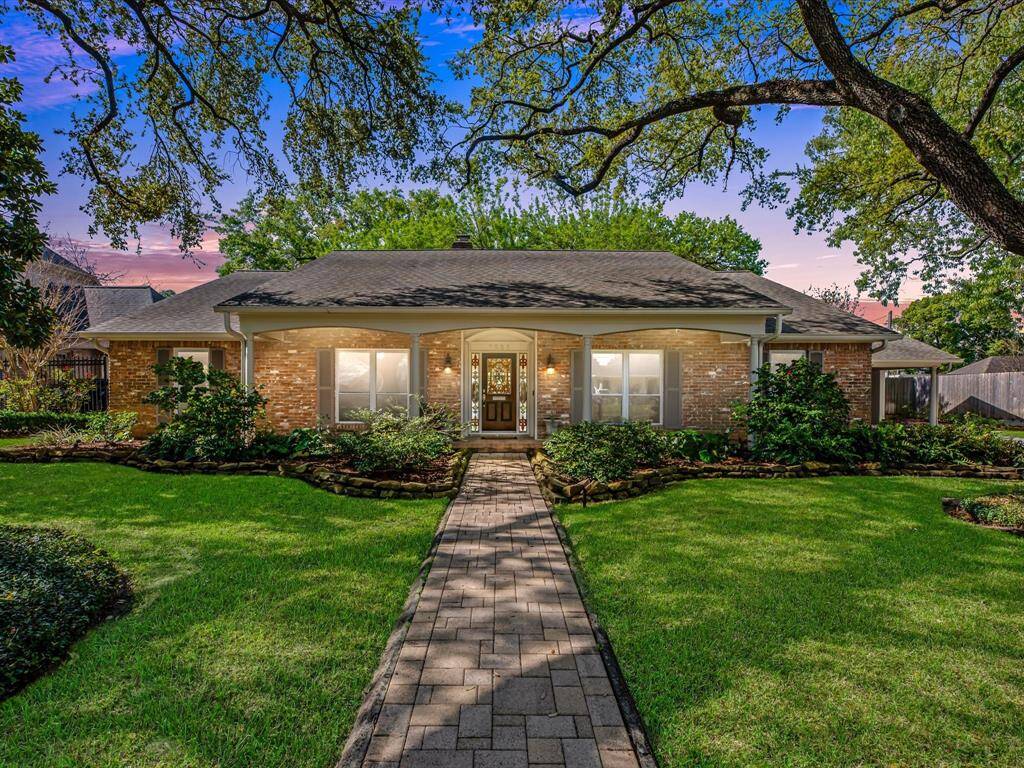 Discover your dream home at 7521 Middlewood. This charming residence boasts stunning curb appeal with its brick exterior and beautifully landscaped yard, inviting you into a warm and welcoming space.