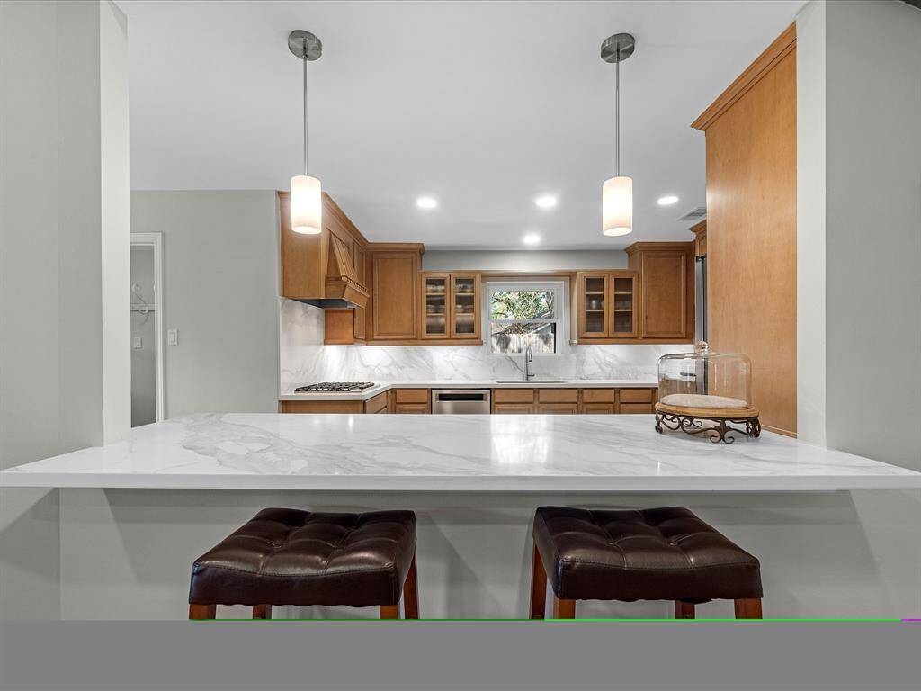 Chic kitchen island with additional seating.
