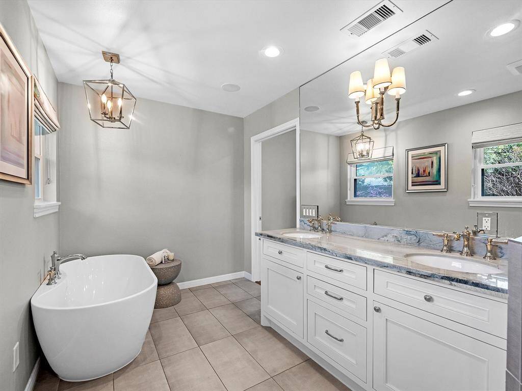 Unwind in luxury with this elegant soaking tub.