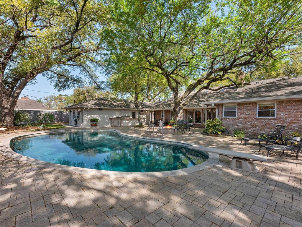 Dive into summer fun with your expansive pool oasis.