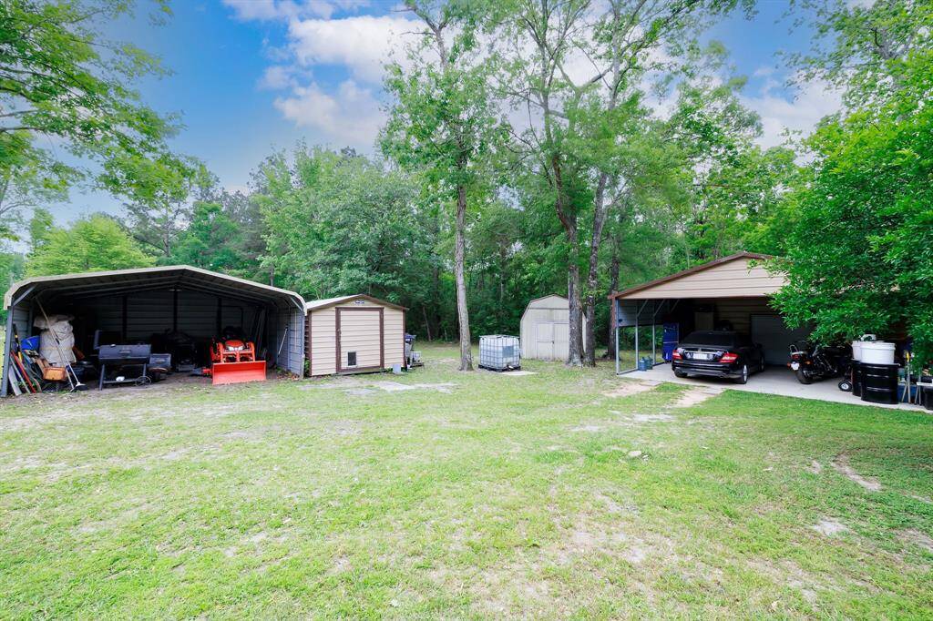 plus a new concrete slab with a 2nd 2 carport and enclosed storage