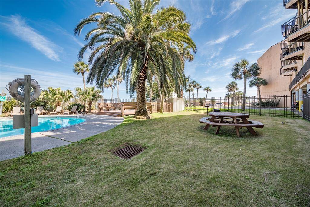 Charcoal grills and picnic tables at pools