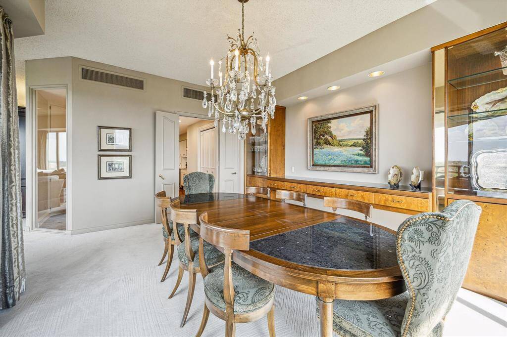 Built-in buffet and lighted cabinets, perfect for entertaining.