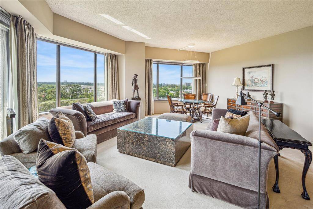 LIVING ROOM: 24 x 20 with expansive views of Memorial Park & River Oaks Golf Course! This rare to the market corner unit has beautiful views!