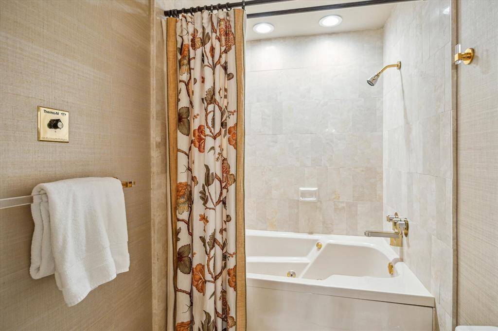 Third full bath with marble counter top & whirlpool tub!