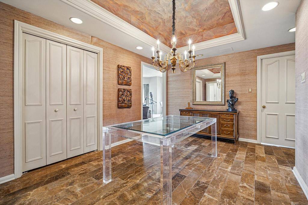 FOYER: 15 x 11 Spacious entry with subway marble floors, conferred ceiling, chandelier and storage closets.