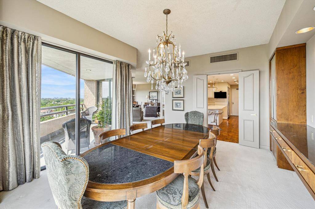 Another view of the dining room. Double doors to kitchen.