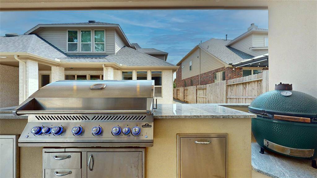 Your vey large outdoor grill and green egg smoker