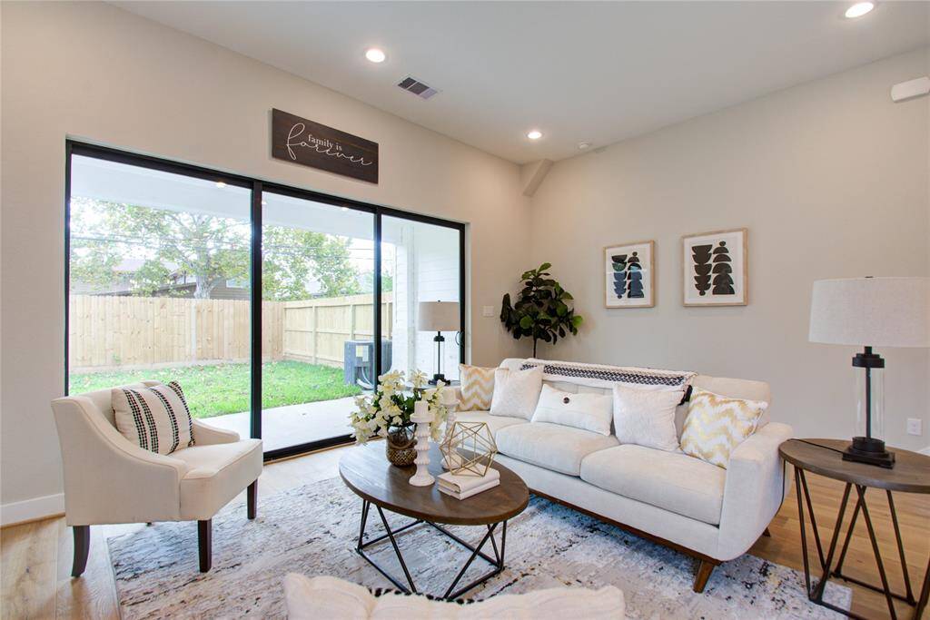 Living area with sliding glass doors into the backyard!