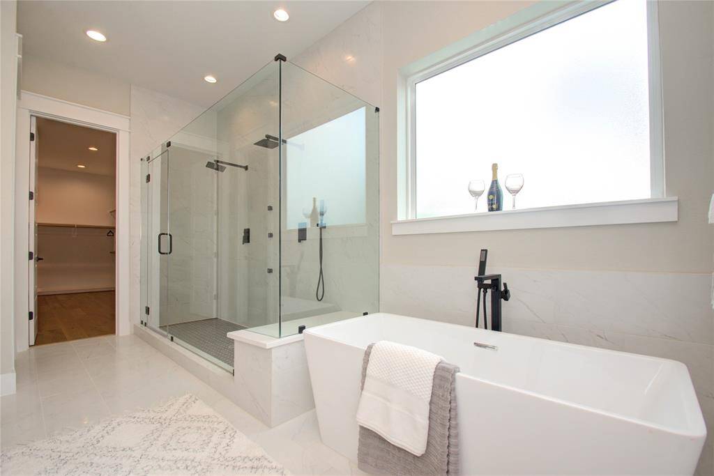 Beautiful stand-alone tub in primary bath!